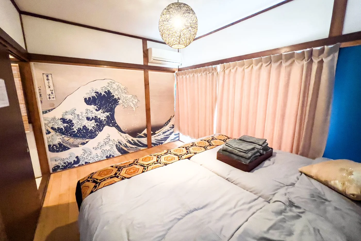 The Great Wave room, with two single beds